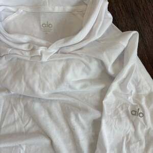 Alo Yoga Conquer Reform Long Sleeve Hooded Shirt White